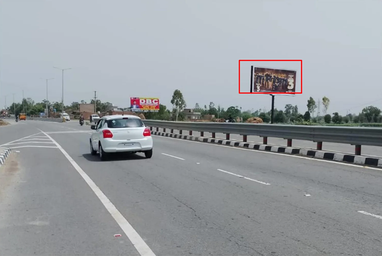 Sangrur Mehlan Road Flyover towards Delhi with 20x10 ft hoarding by ACME Advertising Co., featuring roadside billboard, white car, lane markings, barriers, and clear sky. png