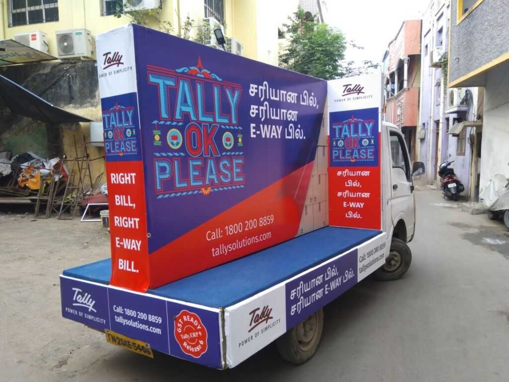 Full vehicle branding design on a promotional van in India