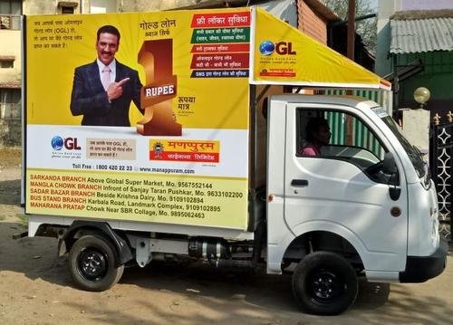 Mobile van branding campaign in a busy Indian market