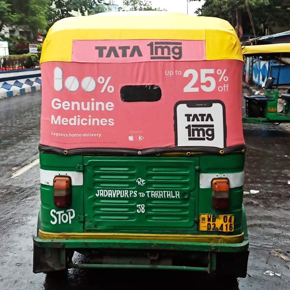 An auto advertiser uses vehicles like taxis, rickshaws, and buses for mobile ads, ensuring high visibility and brand reach on the go.