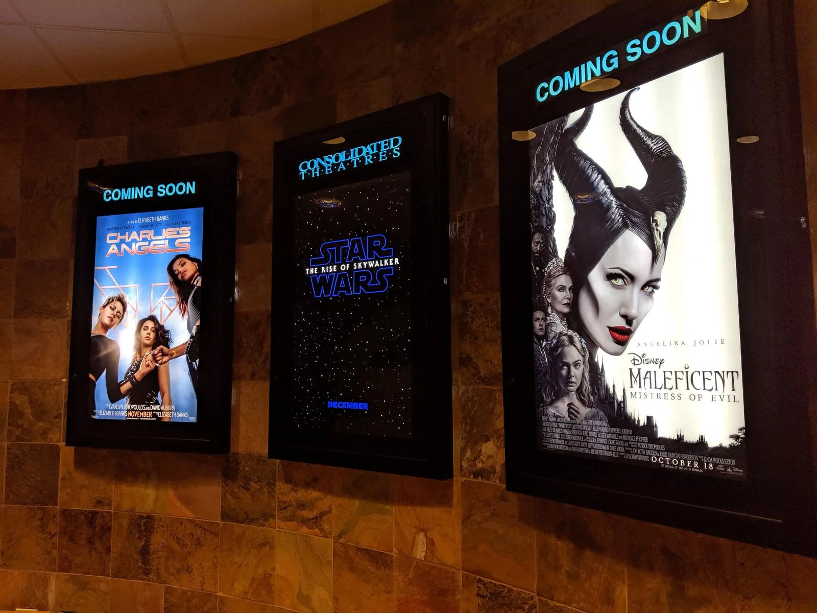 Cinema advertising display on big screen before movie starts, engaging audience with impactful brand message