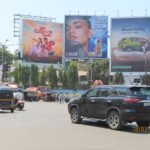 Highway Hoarding Advertising Companies in Rajasthan showcasing a large outdoor billboard promoting a brand along a busy national highway.