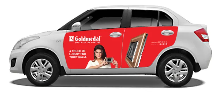 "Goldmedal cab branding on Swift Dzire – side view taxi wrap by ACME Advertising in Delhi NCR."