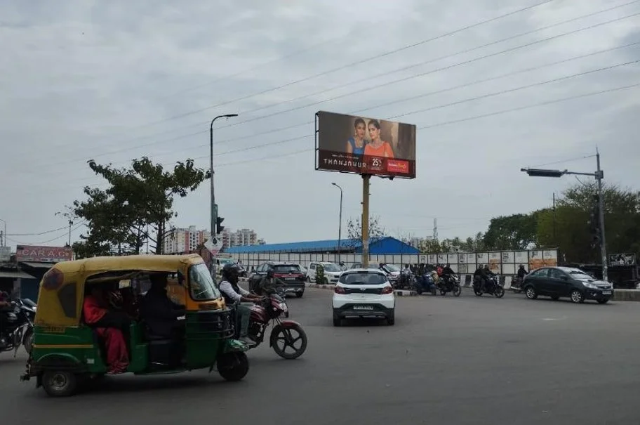 ACME Advertising Co. highway hoarding companies in Lucknow featuring THANJAVUR fashion ad, placed in a busy urban street by top billboard companies.