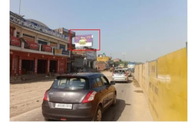 ACME Billboard -Hoarding advertising Companies in Jammu & Kashmir Festive cartoon hoarding near CHAWLA shop, ACME Advertising Co., a leading hoarding advertising company in Jammu and Kashmir.