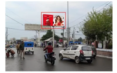 Coca-Cola Billboard - Hoarding advertising Companies in J&K Coca-Cola hoarding above busy street ACME Advertising Co., a top hoarding advertising companies in Jammu and Kashmir, delivers festive urban branding.