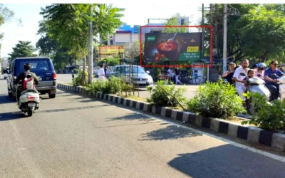 Festive hoarding by ACME - Hoarding Companies in J&K Street scene with festive cartoon hoarding, CHAWLA shop, and ACME Advertising Co.'s outdoor branding in Jammu and Kashmir.