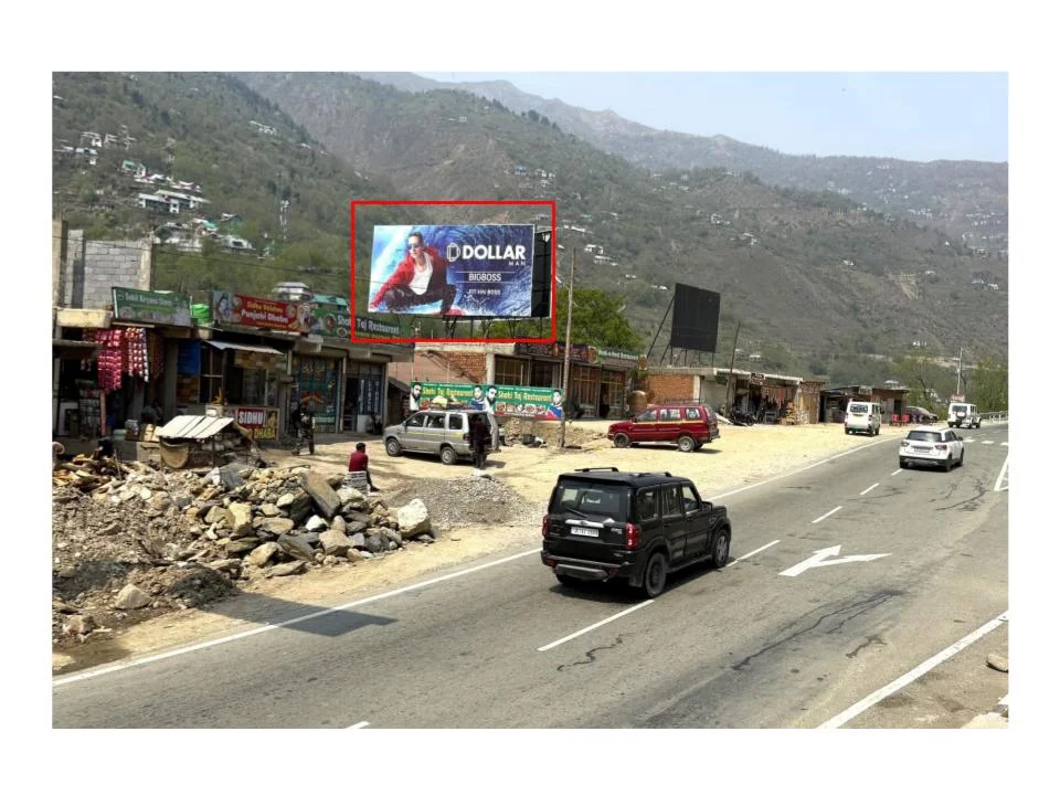 DOLLAR Billboard - billboard advertising Companies in Jammu & Kashmir DOLLAR apparel billboard in hilly roadside scene ACME Advertising Co., top billboard advertising companies in Jammu & Kashmir, promotes comfort branding.