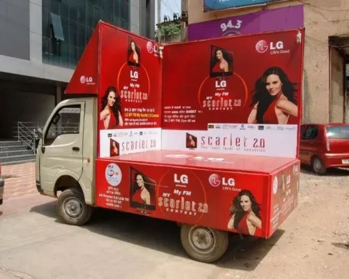 Truck advertising of LG Scarlet 2.0 – Film Contest on Wheels Truck advertising vehicle promoting LG Scarlet 2.0 film contest with branded visuals and celebrity-led campaign.