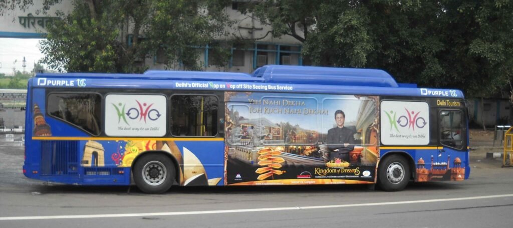 Bus advertisement agency managing bus advertising campaign on city roads in India