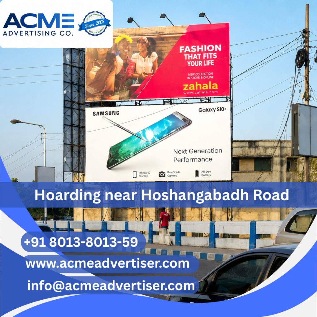 Large outdoor hoarding advertisement by Acme Advertising Co. near Hoshangabadh Road for high-visibility brand promotion.