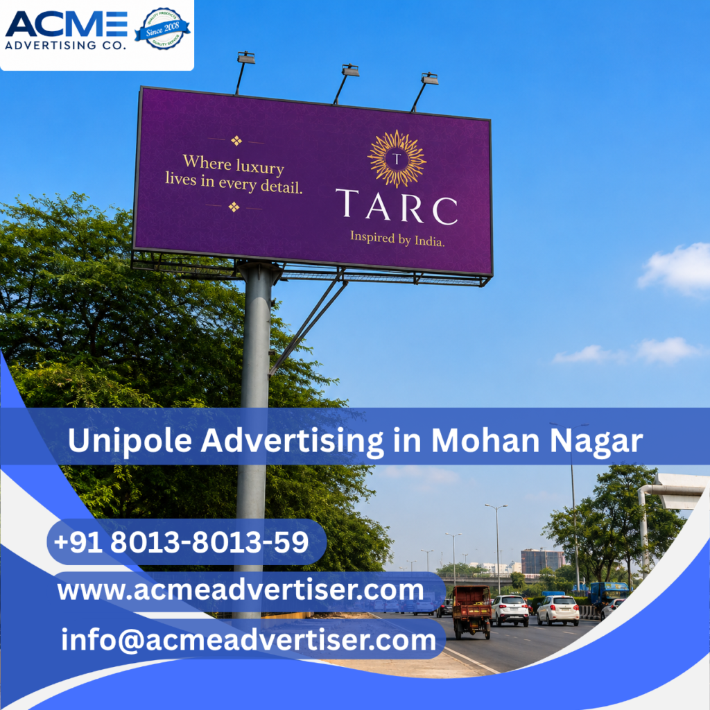 High-visibility unipole advertising display by ACME Advertising Co. in Mohan Nagar at a prime roadside commercial location.