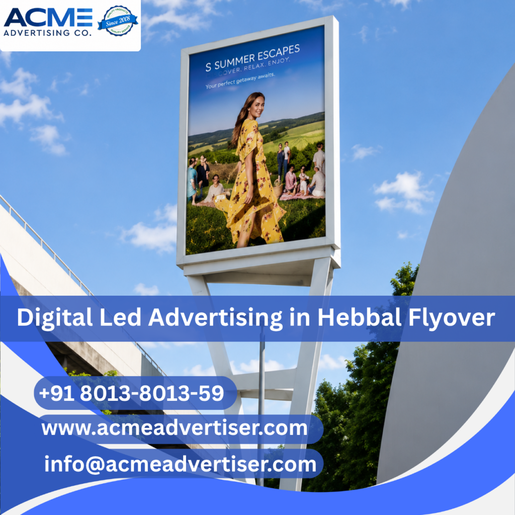 Large digital LED advertising display by ACME Advertising Co. at Hebbal Flyover on a high-traffic roadside location.