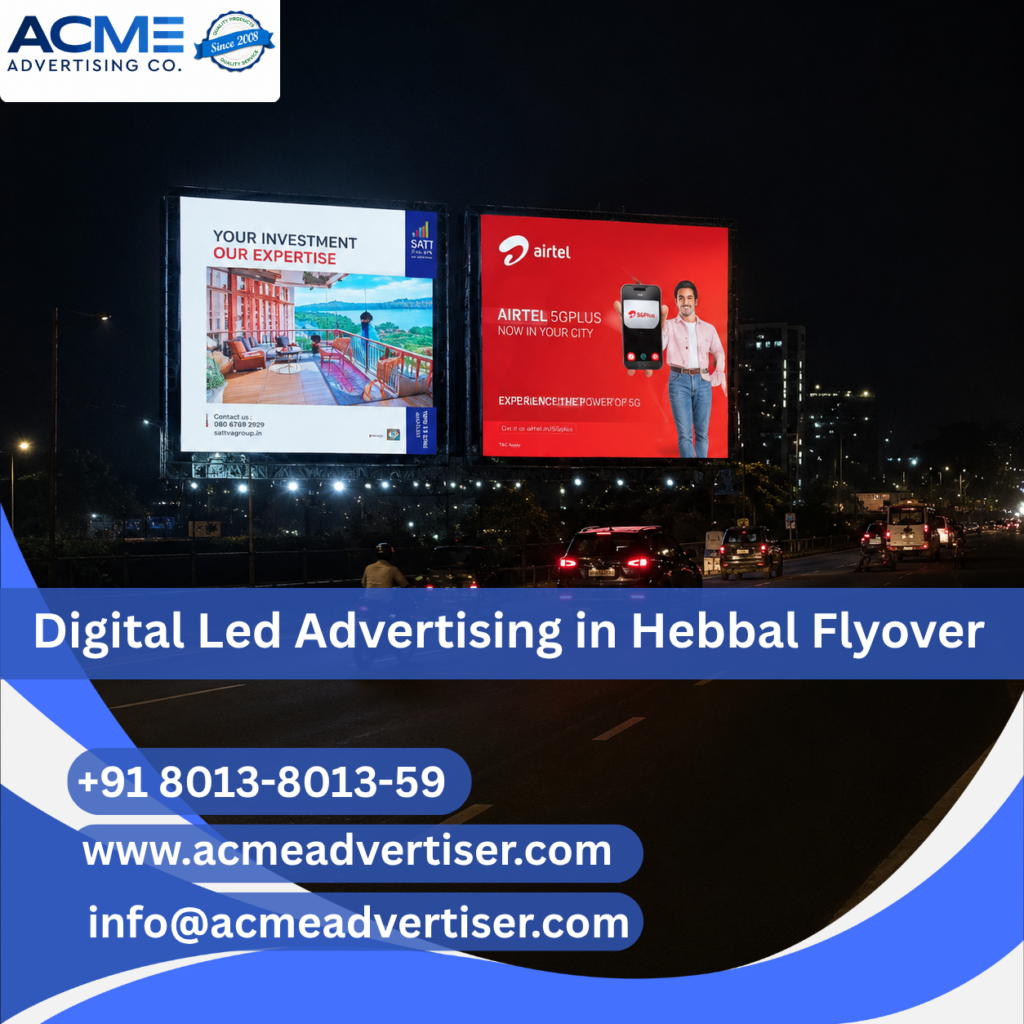 Large digital LED advertising display by ACME Advertising Co. at Hebbal Flyover on a high-traffic roadside location.