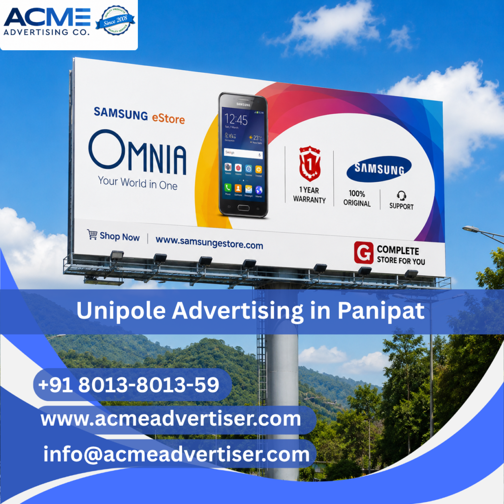 High-visibility unipole advertising display by ACME Advertising Co. in Panipat at a busy roadside commercial location.