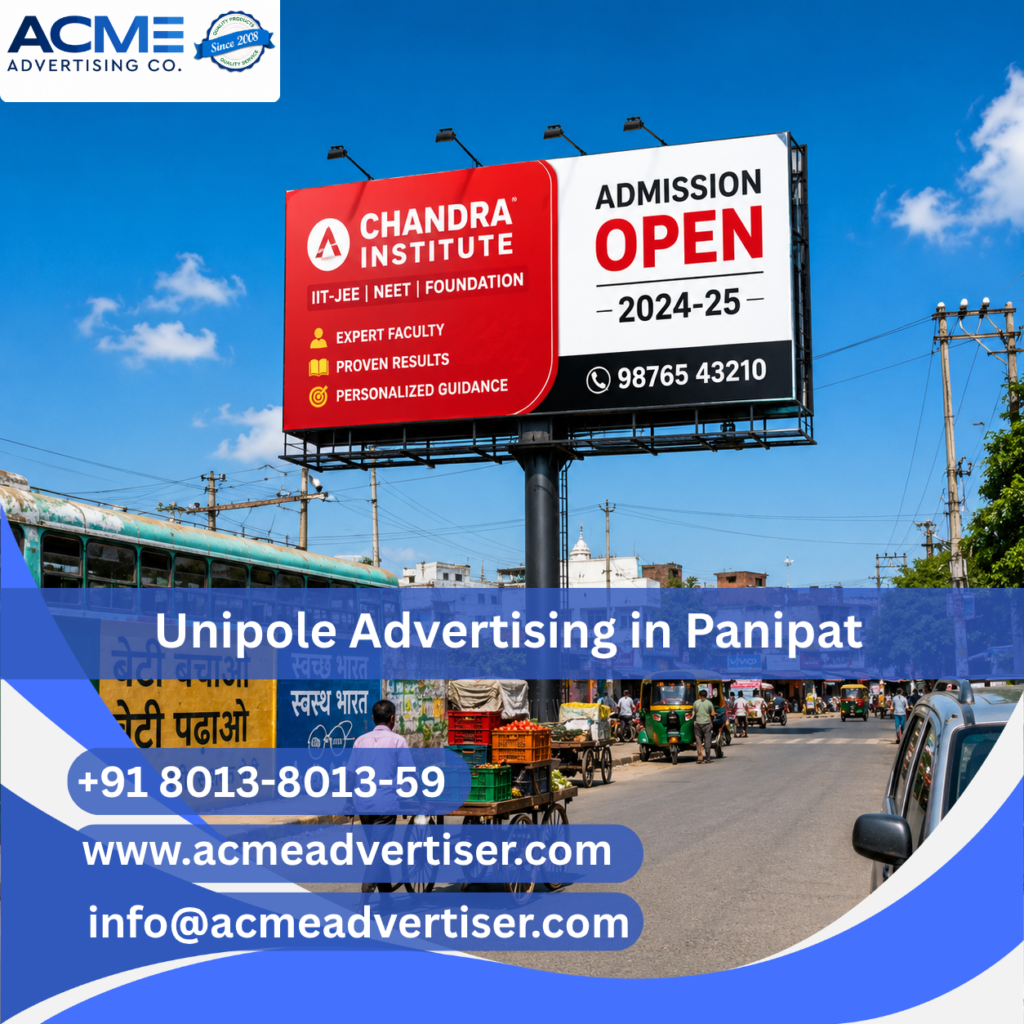 High-visibility unipole advertising display by ACME Advertising Co. in Panipat at a busy roadside commercial location.