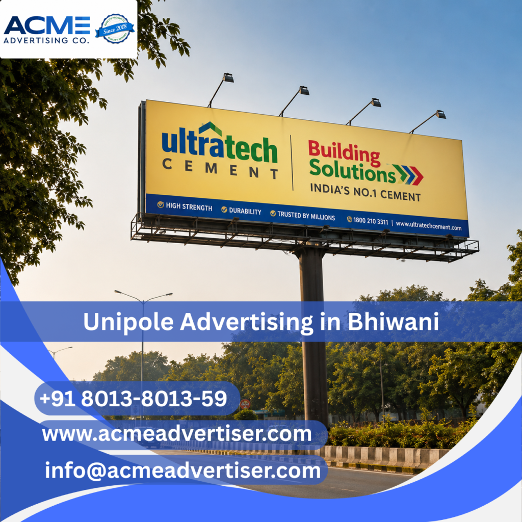 Large unipole advertising display by ACME Advertising Co. in Bhiwani at a high-traffic roadside location.