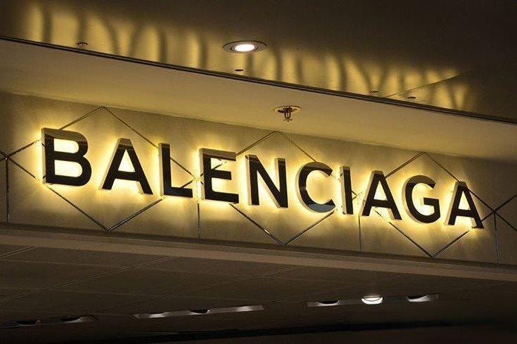 Balenciaga luxury retail signage using illuminated signages board advertising for premium brand presence