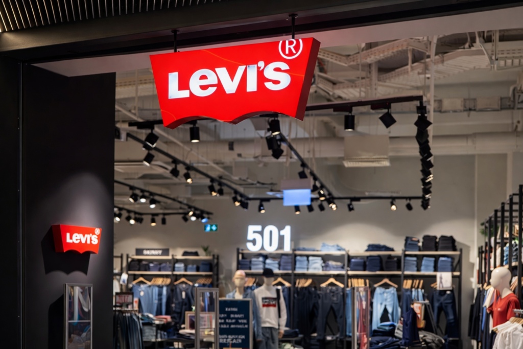 Levi’s hanging retail signage inside a store using bold signages board advertising for brand recall