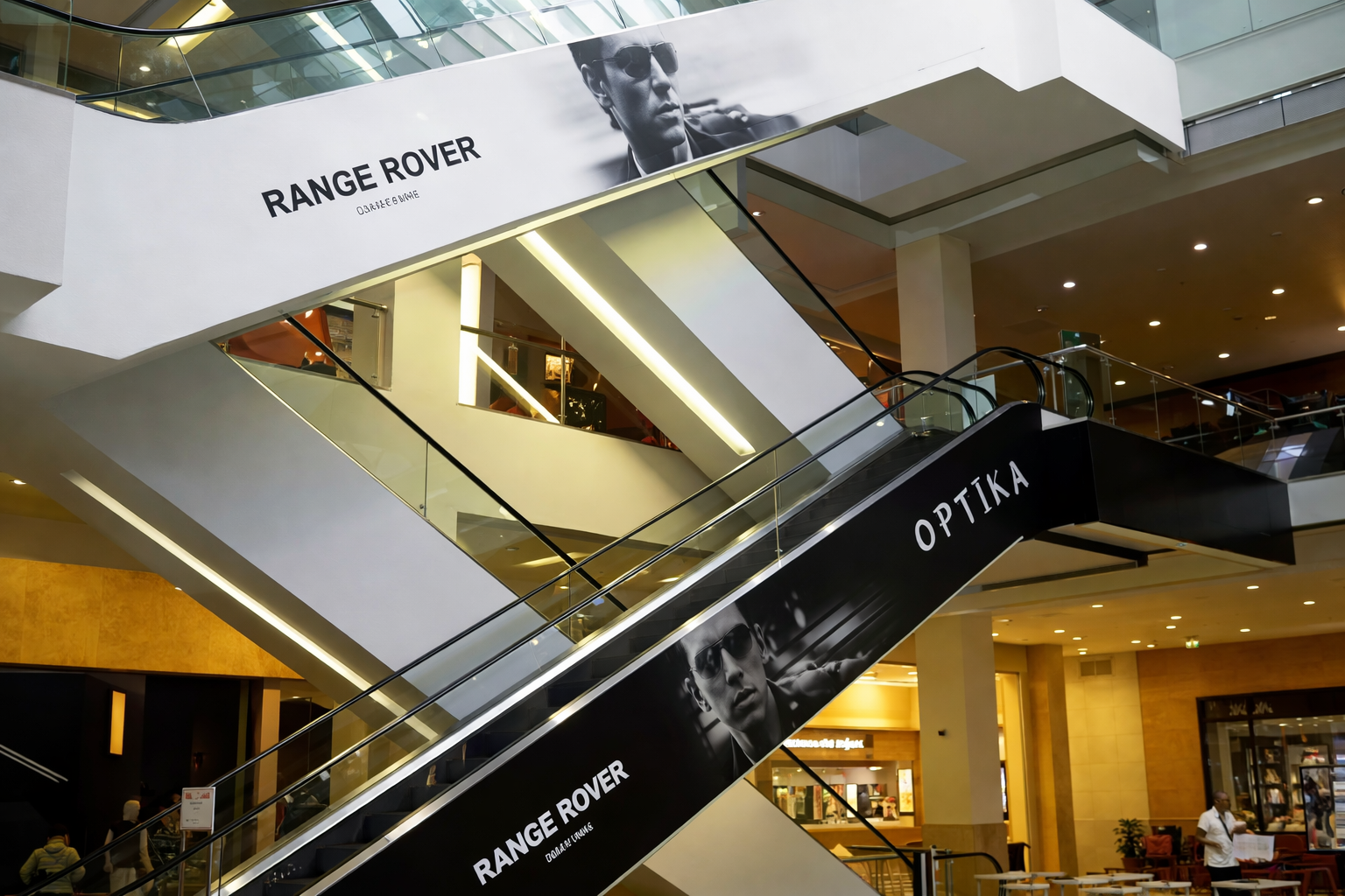 Escalator branding mall advertising display inside shopping mall by ACME Advertising
