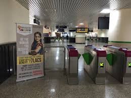 Metro station entry gate advertising in Aluva (Terminal) in Kochi - 
