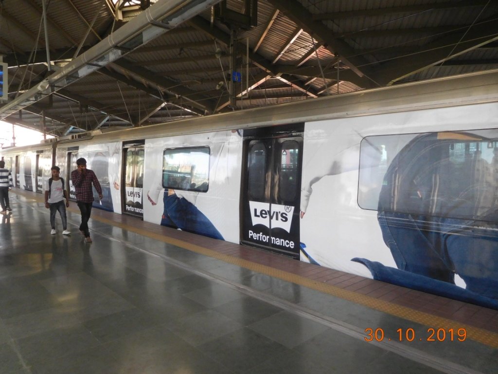 Metro train exterior wrap branding in Noida Sector 16 - 