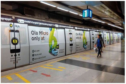 Metro train wrap advertising at Ashok Park Main station - 