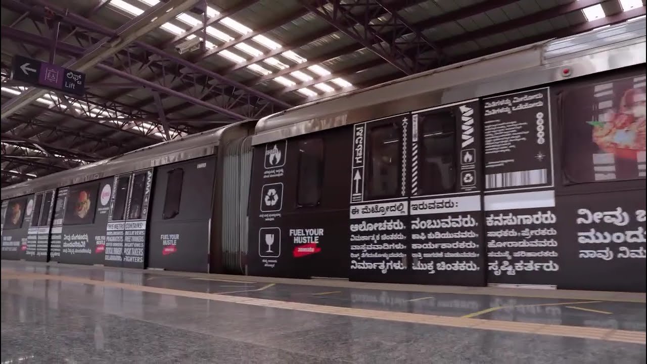Metro train wrap advertising at Nangloi station - 