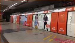 Metro train wrap advertising at Patel Nagar - 