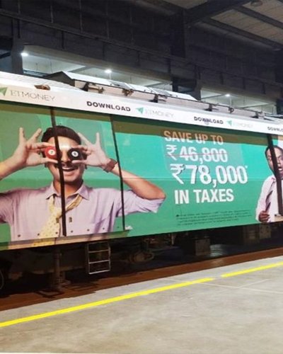 Metro train wrap advertising at Satguru Ram Singh Marg station - 