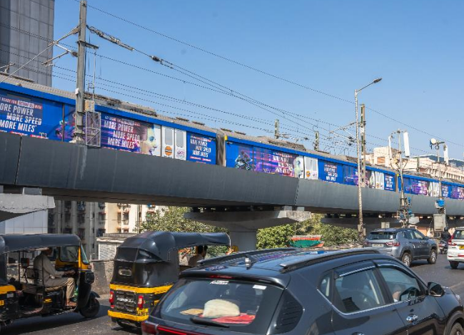 Metro train wrap advertising in Dahanukarwadi, Mumbai - 
