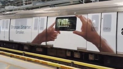 Metro train wrap advertising in Yamuna Bank - 