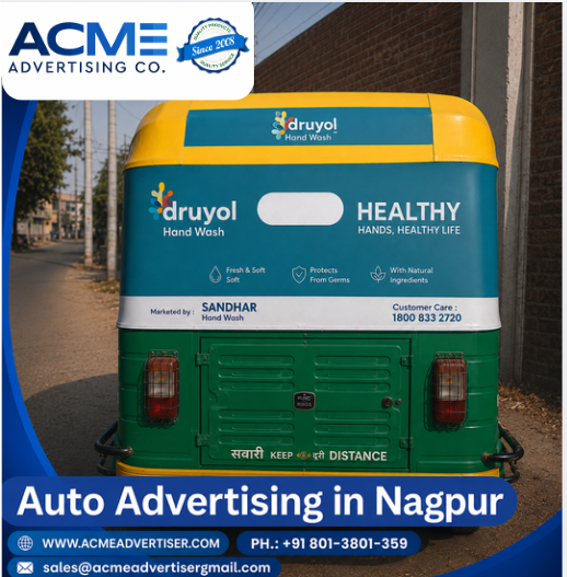 Green and yellow auto rickshaw parked on a roadside in Nagpur with a colorful branded rear panel and urban background.