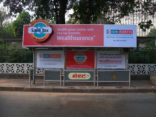 bus shelter branding with Acme Advertising Co.
